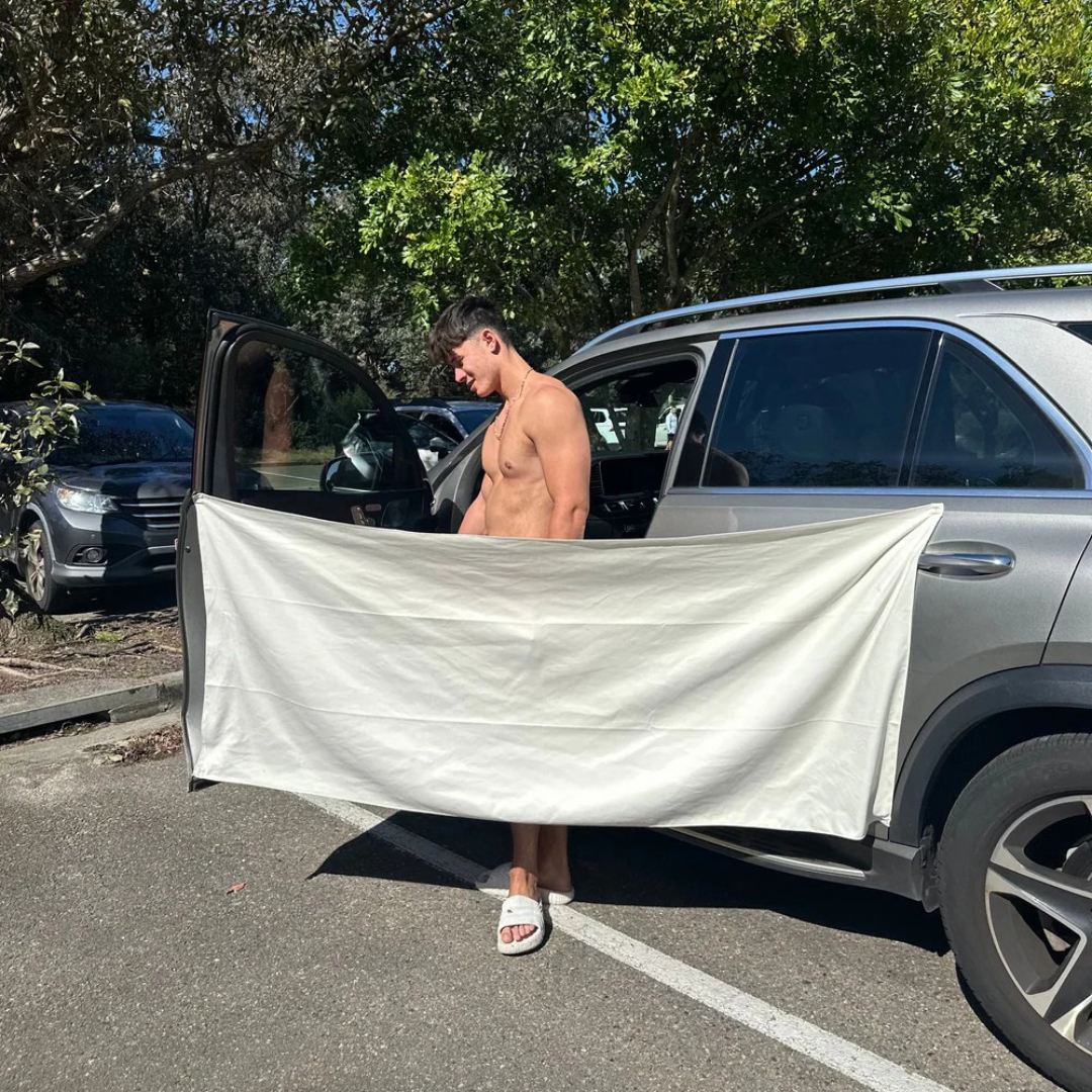 Portable magnetic multi-purpose bath towel