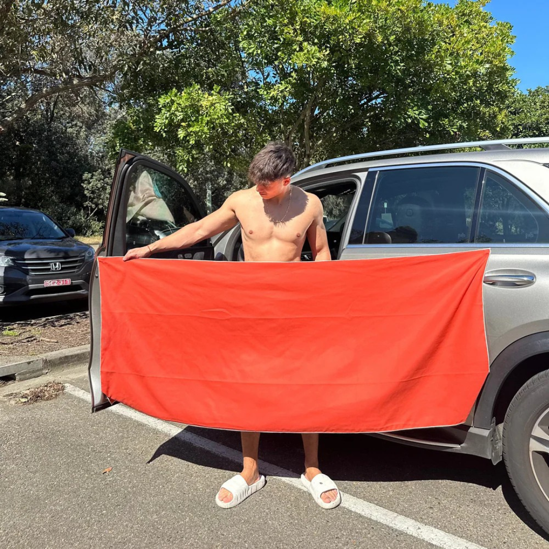 Portable magnetic multi-purpose bath towel