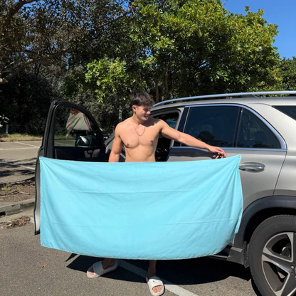 Portable magnetic multi-purpose bath towel